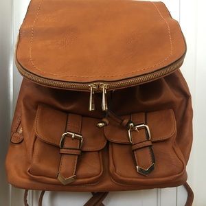 Cognac Brown leather backpack